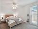 Bedroom with ceiling fan, large windows, and ample natural light at 11467 93Rd St, Largo, FL 33773