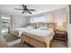 A cozy bedroom featuring two twin beds with views to the outside pool area at 11467 93Rd St, Largo, FL 33773