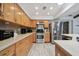 Updated kitchen featuring stainless steel appliances and lots of cabinet space at 11467 93Rd St, Largo, FL 33773