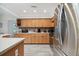 Bright kitchen featuring stainless steel appliances, generous counter space, and abundant cabinetry at 11467 93Rd St, Largo, FL 33773