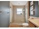 Modern bathroom with tiled walk-in shower with a glass door at 11467 93Rd St, Largo, FL 33773