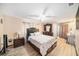 Spacious bedroom with light colored walls, wood floors, and a closet at 1371 Meredith Dr, Spring Hill, FL 34608