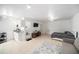 This open-concept living space has tile floors and bright natural light at 1371 Meredith Dr, Spring Hill, FL 34608
