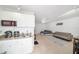 This open-concept living space has tile floors and bright natural light at 1371 Meredith Dr, Spring Hill, FL 34608