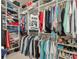 A well-organized walk-in closet with shelves, hanging rods, and ample storage space for clothes and accessories at 150 Chippewa Ave, Tampa, FL 33606