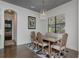 Cozy dining area with natural lighting, a stylish table, and easy access to other living spaces at 150 Chippewa Ave, Tampa, FL 33606