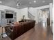 Spacious living room with staircase and hardwood floors, perfect for entertaining at 150 Chippewa Ave, Tampa, FL 33606