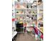 Walk-in pantry with white shelving provides ample storage for groceries and kitchen essentials at 150 Chippewa Ave, Tampa, FL 33606