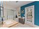 Bright bathroom with a modern vanity, tiled shower, and serene outdoor view at 15702 Richboro Ct, Tampa, FL 33647