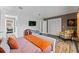Stylish bedroom featuring neutral colors and access to the ensuite bath and closet at 15702 Richboro Ct, Tampa, FL 33647