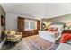 Bright bedroom with ample closet space and built-in storage surrounding a bright window at 15702 Richboro Ct, Tampa, FL 33647
