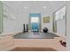 Bright exercise room with gym equipment and natural light at 15702 Richboro Ct, Tampa, FL 33647