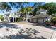 Beautiful home showcasing architectural design, attached two-car garage, and driveway space at 15702 Richboro Ct, Tampa, FL 33647