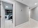Well-lit laundry room with modern washer and dryer units at 15702 Richboro Ct, Tampa, FL 33647