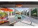 Large screened pool with hot tub, outdoor seating, and lush landscaping at 15702 Richboro Ct, Tampa, FL 33647