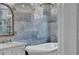 The bathroom features a soaking tub and a chandelier at 15861 Starling Water Dr, Lithia, FL 33547