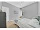 A bedroom with light grey walls and neutral carpet at 15861 Starling Water Dr, Lithia, FL 33547