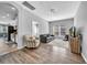 Inviting living room with hardwood floors and a cozy seating area at 15861 Starling Water Dr, Lithia, FL 33547