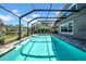 Relaxing enclosed pool area with clear water and a patio for outdoor enjoyment at 15861 Starling Water Dr, Lithia, FL 33547