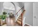 Interior view of a staircase leading to the upper level and a view of the dining room at 15861 Starling Water Dr, Lithia, FL 33547