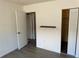 Bedroom featuring neutral walls, wood-look flooring and closet storage at 1830 Bough Ave # 4, Clearwater, FL 33760