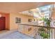 Courtyard-facing open-air condo balcony at 18400 Gulf Blvd # 1211, Indian Shores, FL 33785