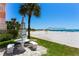 Beach area with table and benches near the beach volleyball court at 18400 Gulf Blvd # 1211, Indian Shores, FL 33785