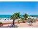 Breathtaking beach view with grills and outdoor seating, perfect for enjoying the ocean breeze and a relaxing meal at 18400 Gulf Blvd # 1211, Indian Shores, FL 33785