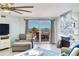 Living room with modern decor and a beachfront balcony view at 18400 Gulf Blvd # 1211, Indian Shores, FL 33785