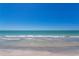 Beautiful ocean front view with clear turquoise water and sandy beach at 18400 Gulf Blvd # 1211, Indian Shores, FL 33785