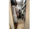 Walk-in closet with ample storage and organization for clothes and accessories at 19113 Doves Landing Dr, Tampa, FL 33647