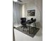 Cozy home office space with modern desk, artwork, and sleek decor, ideal for productivity at 19113 Doves Landing Dr, Tampa, FL 33647