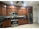 Well-lit kitchen features stainless steel appliances and ample cabinet space at 19113 Doves Landing Dr, Tampa, FL 33647