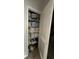 Organized linen closet filled with towels and essentials at 19113 Doves Landing Dr, Tampa, FL 33647