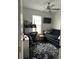 Small office with a functional desk, comfortable chair, and a cozy daybed at 19113 Doves Landing Dr, Tampa, FL 33647