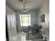 Bright office with a ceiling fan and large, convenient wardrobe storage system at 19113 Doves Landing Dr, Tampa, FL 33647