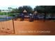 Brand new playground area featuring swings, slides, and climbing structures for enjoyment at 19113 Doves Landing Dr, Tampa, FL 33647