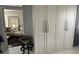 Hallway with large storage closets, offering plenty of space with easy access to living area at 19113 Doves Landing Dr, Tampa, FL 33647