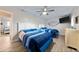 Bedroom with two twin beds, light walls and coastal decor at 19823 Gulf Blvd # 42, Indian Shores, FL 33785