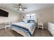 Bright bedroom with a large bed, ceiling fan, and ample natural light at 19823 Gulf Blvd # 42, Indian Shores, FL 33785