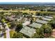 Extensive recreation area featuring multiple tennis courts and pickleball courts, with mature landscaping and a clubhouse at 20 Iris Pl, Oldsmar, FL 34677