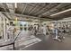 Spacious gym with modern exercise equipment and large windows offering plenty of natural light at 20 Iris Pl, Oldsmar, FL 34677