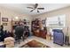 Functional office space with built-in shelving, desk area, and plenty of natural light at 20 Iris Pl, Oldsmar, FL 34677