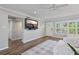 Bright living room with hardwood floors, fresh paint, and recessed lighting at 2310 Sunrise Se Dr, St Petersburg, FL 33705