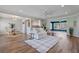 Open concept living room with hardwood floors, recessed lighting, and modern decor at 2310 Sunrise Se Dr, St Petersburg, FL 33705