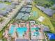 Aerial view of the community pool, sports courts, and amenities at 2632 Tarragona Way, Wesley Chapel, FL 33543