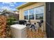 Back of the home featuring a generator and pool equipment at 2632 Tarragona Way, Wesley Chapel, FL 33543