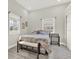 Bright bedroom with vaulted ceiling, two windows, and modern furnishings at 2818 N 19Th St, Tampa, FL 33605