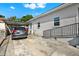 Exterior view showing covered carport and ramp access at 2818 N 19Th St, Tampa, FL 33605