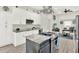 Modern kitchen features granite countertops, stainless appliances, and an island cooktop at 2818 N 19Th St, Tampa, FL 33605
